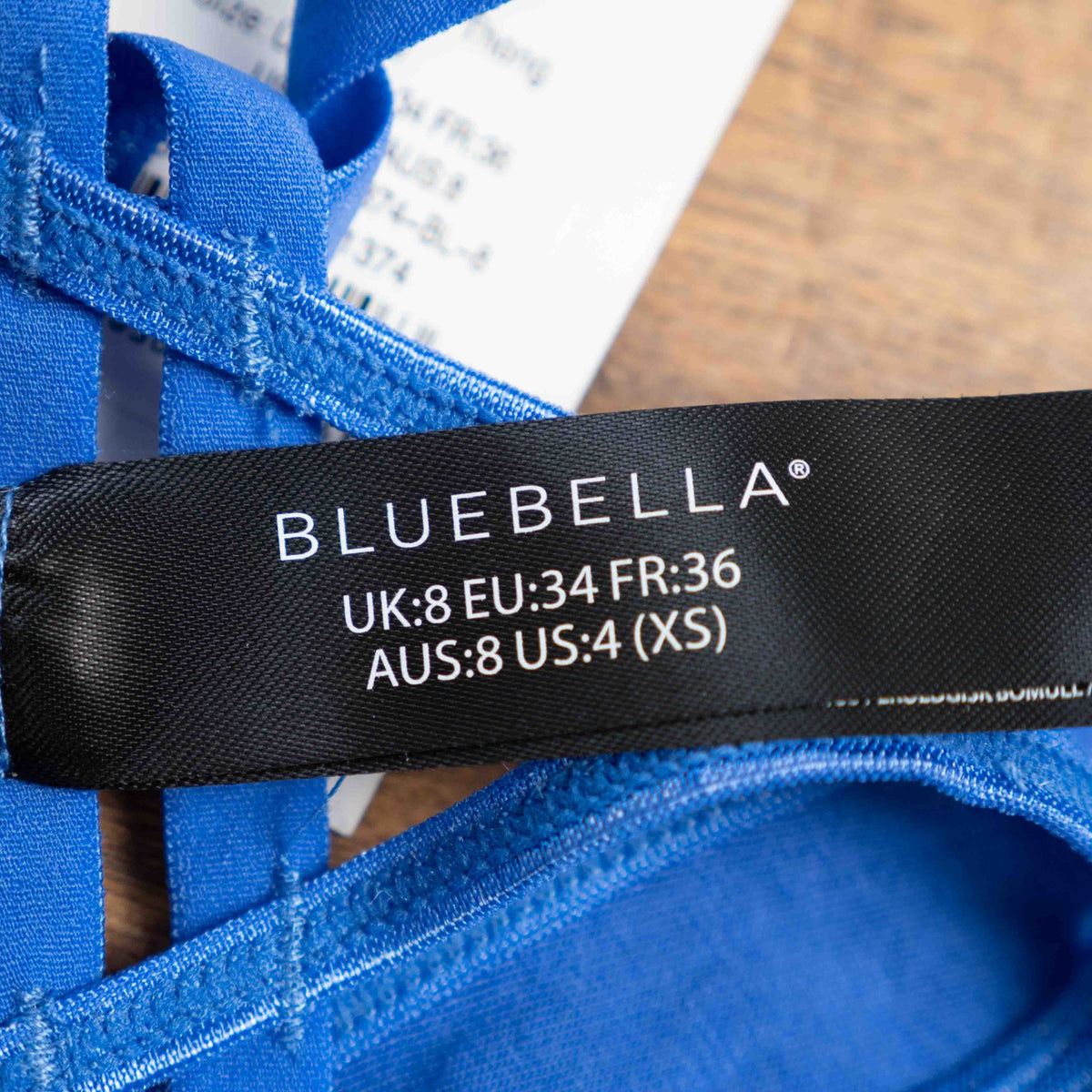 Bluebella blue lace thong with mesh detailing and elastic waistband featuring logo.