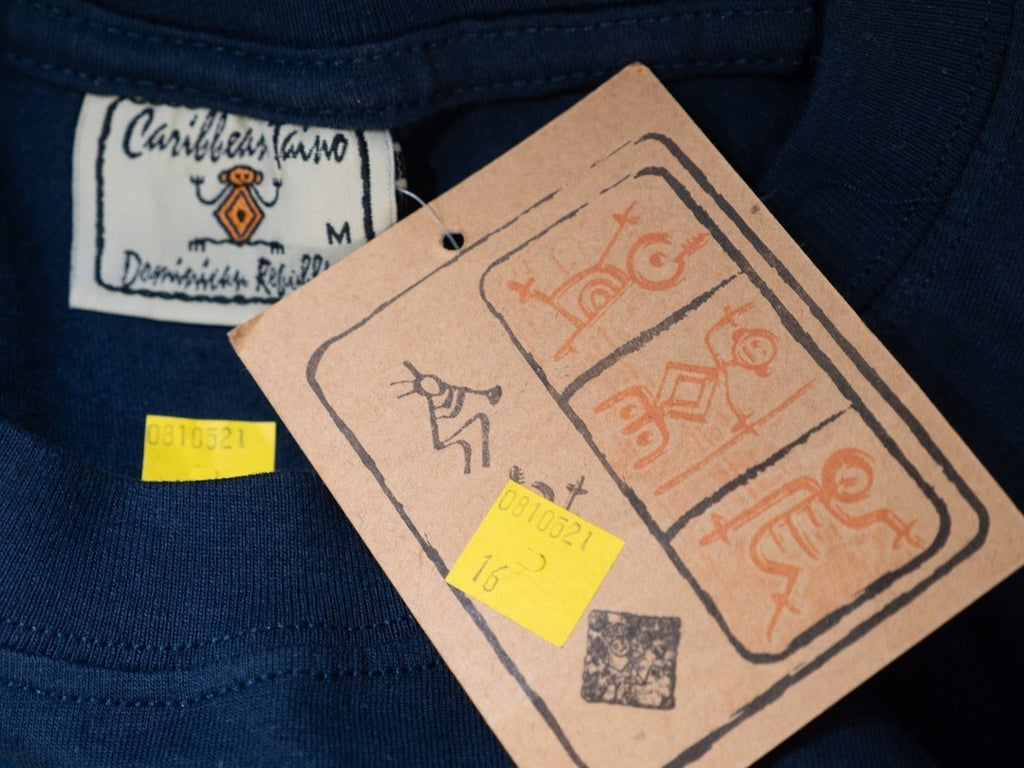 Caribbean Taino blue t-shirt featuring turtle print design on front, short sleeves.