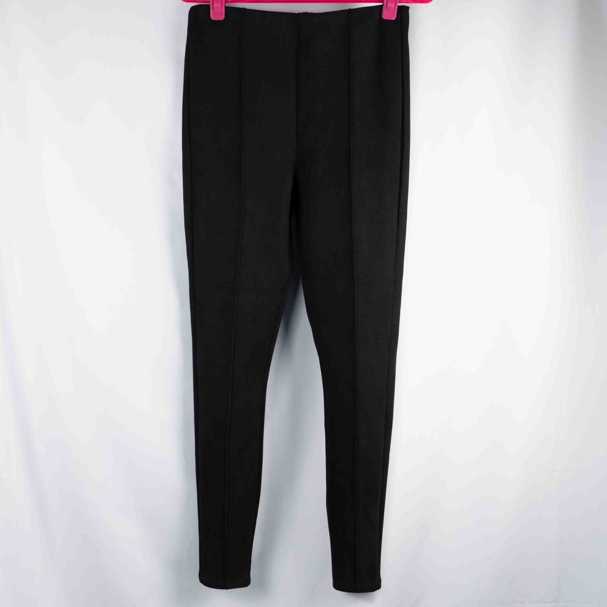 New Look black leggings with elasticated waistband and central line detail, size 10.