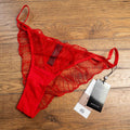 Bluebella red lace briefs with adjustable side straps and delicate lace detailing.