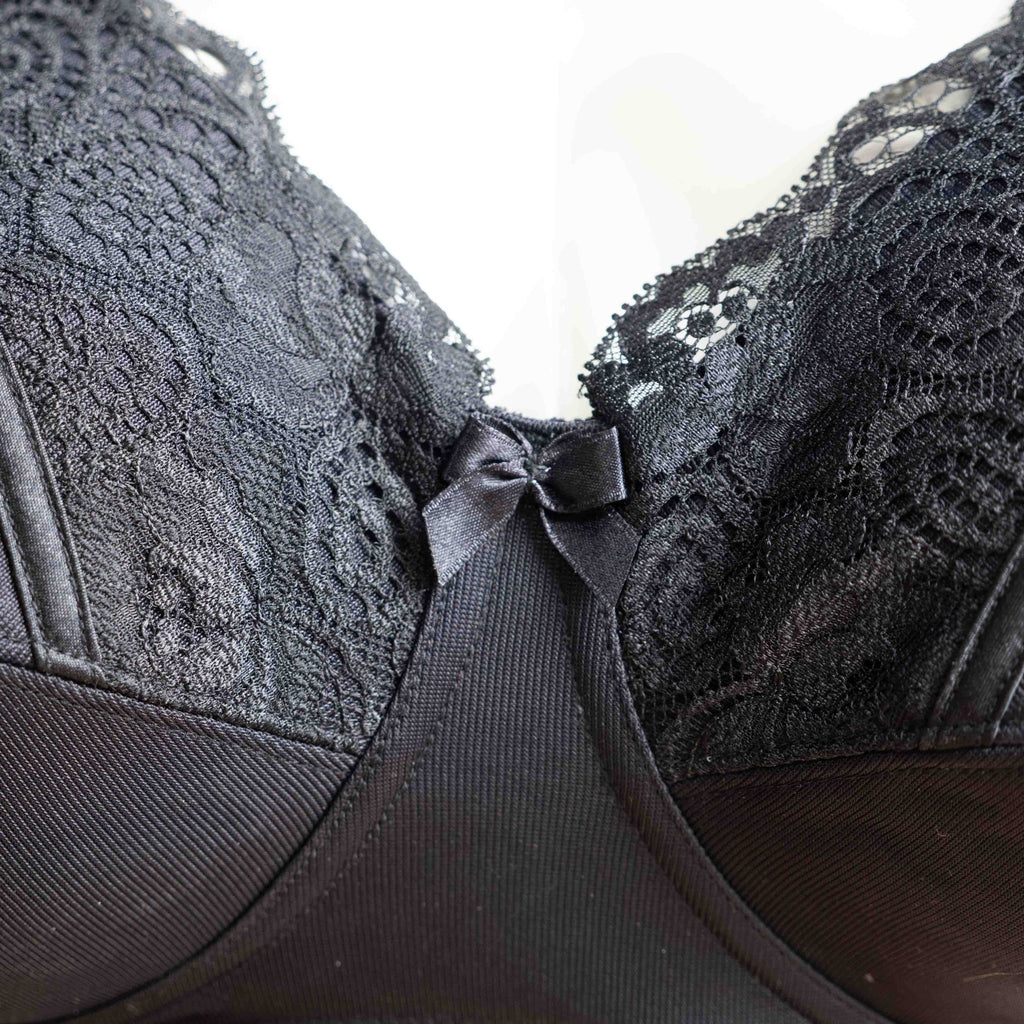 Anonymous black lace bra with soft cups and adjustable straps, brand new with tags.
