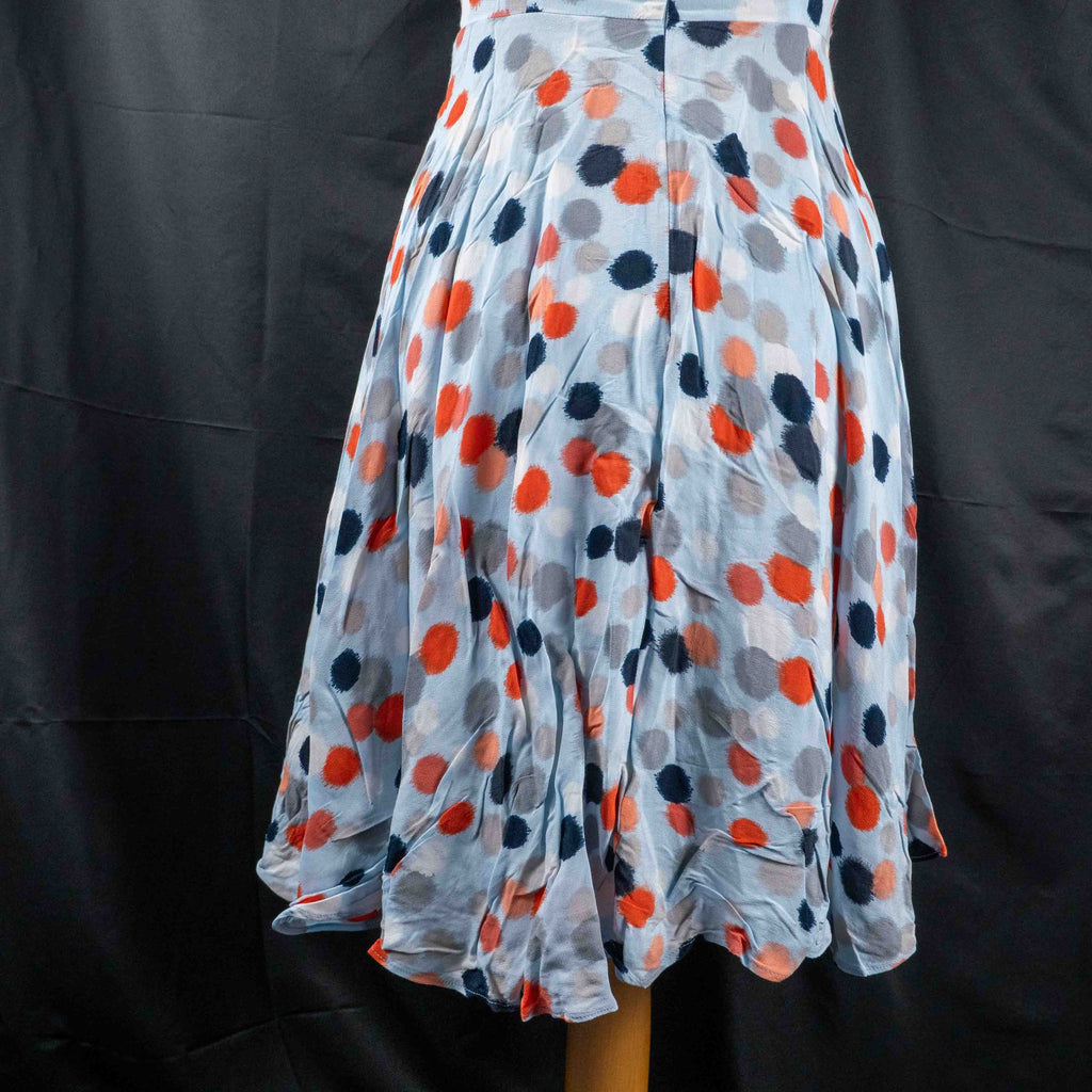 Hobbs London blue multicolour polka dot dress with ruffle hem and fitted waist.