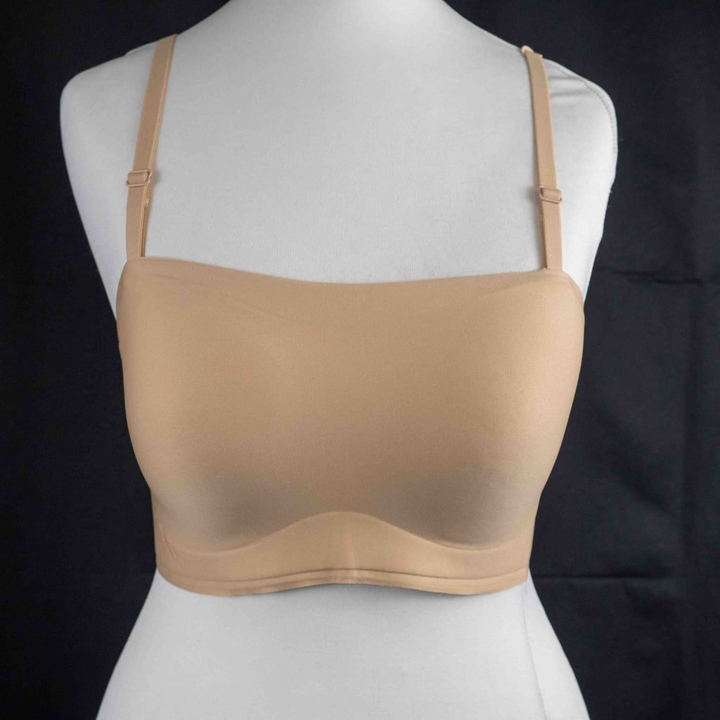 Celeste D'Or beige convertible strapless bra with adjustable straps and back hook closure.