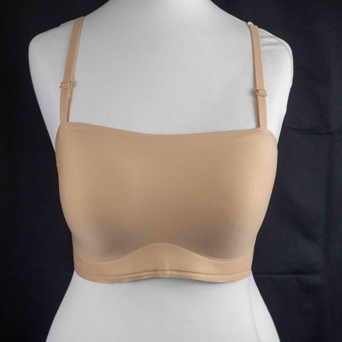 Celeste D'Or beige convertible strapless bra with adjustable straps and back hook closure.
