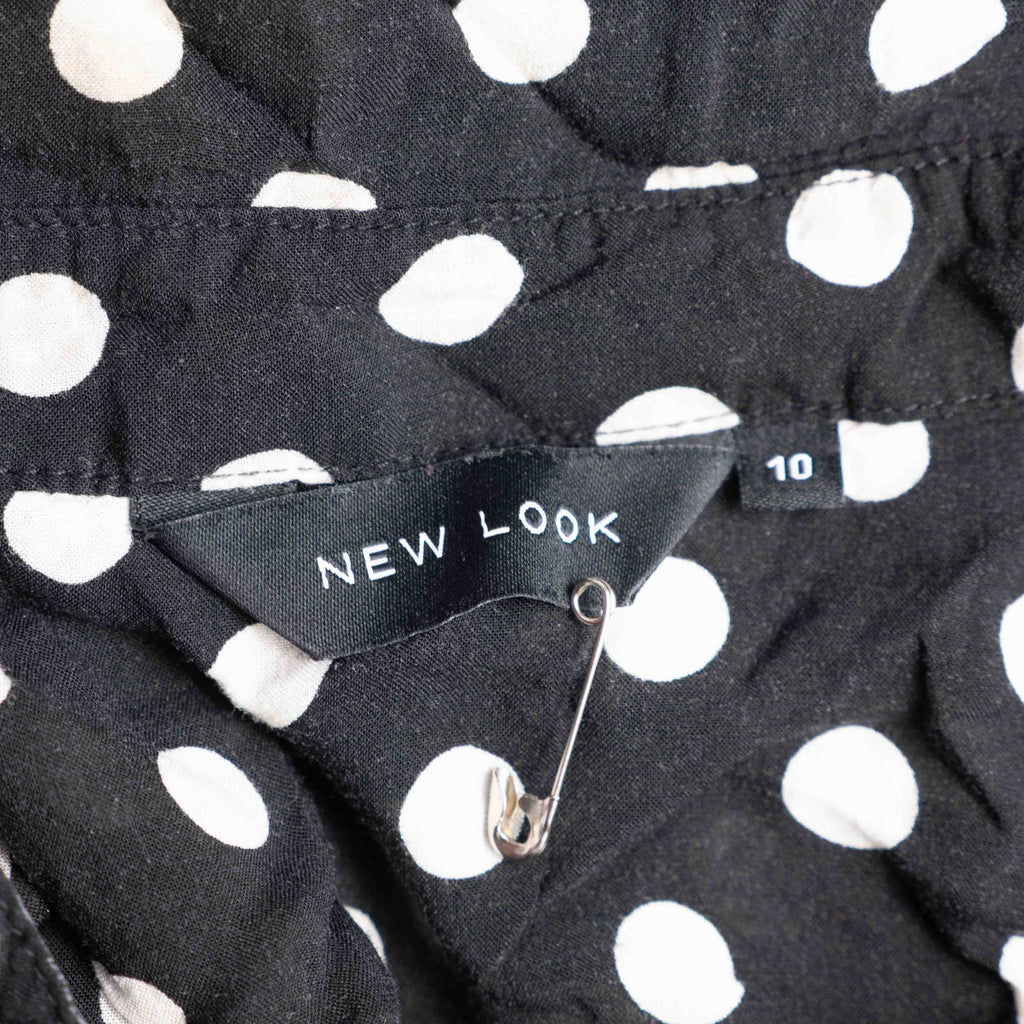 New Look button-up shirt black and white polka dot pattern with chest pocket.