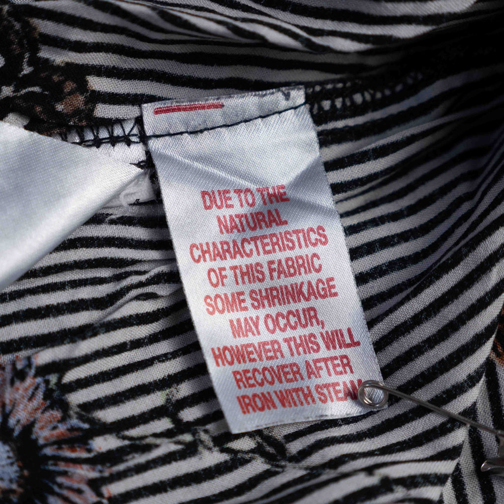 Dorothy Perkins black and white striped blouse with colourful butterfly print and tie cuffs.