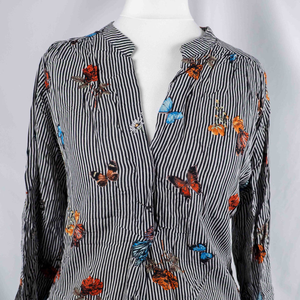 Dorothy Perkins black and white striped blouse with colourful butterfly print and tie cuffs.