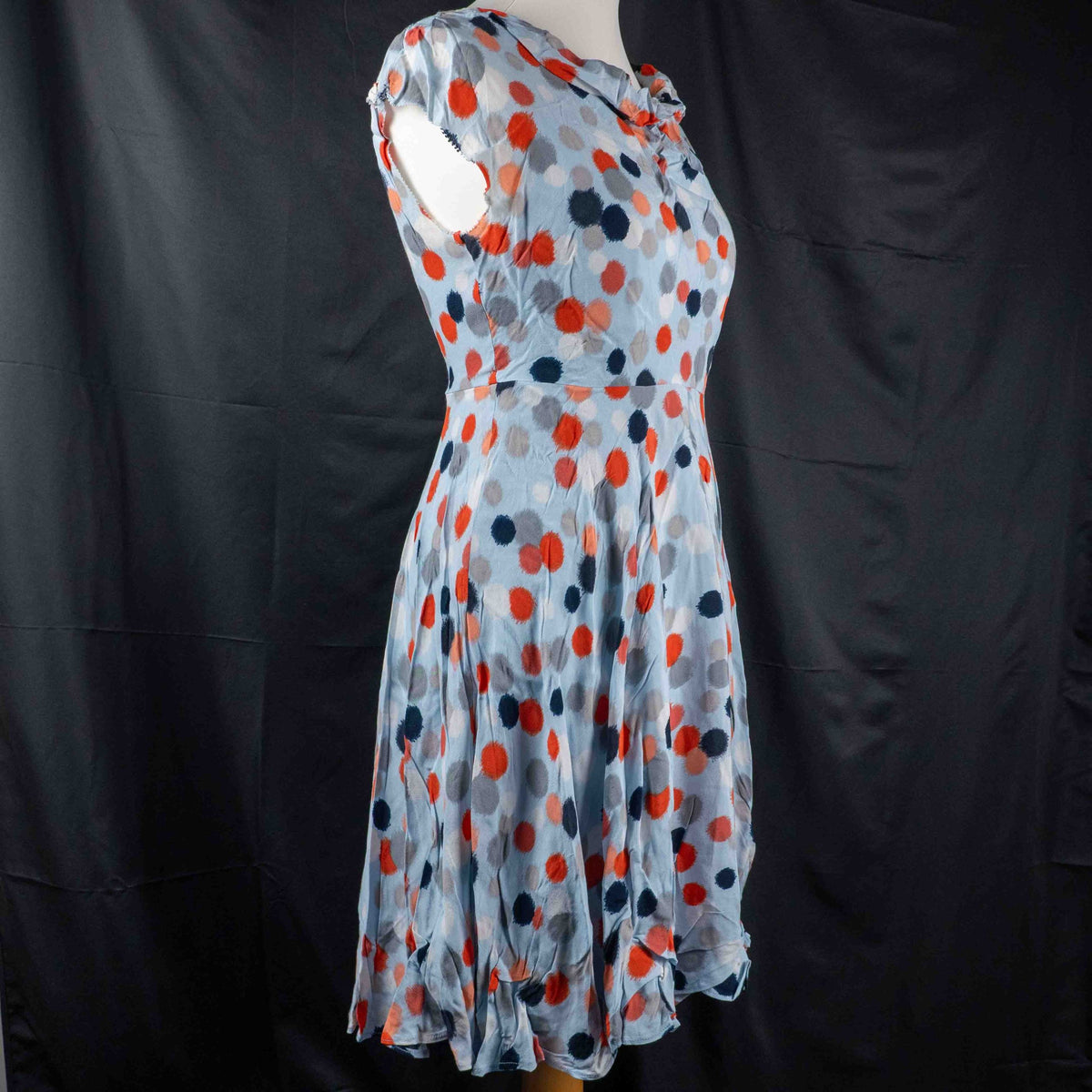 Hobbs London blue multicolour polka dot dress with ruffle hem and fitted waist.