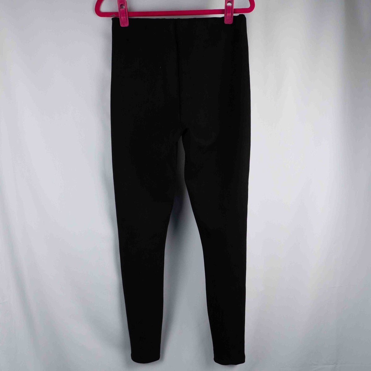 New Look black leggings with elasticated waistband and central line detail, size 10.