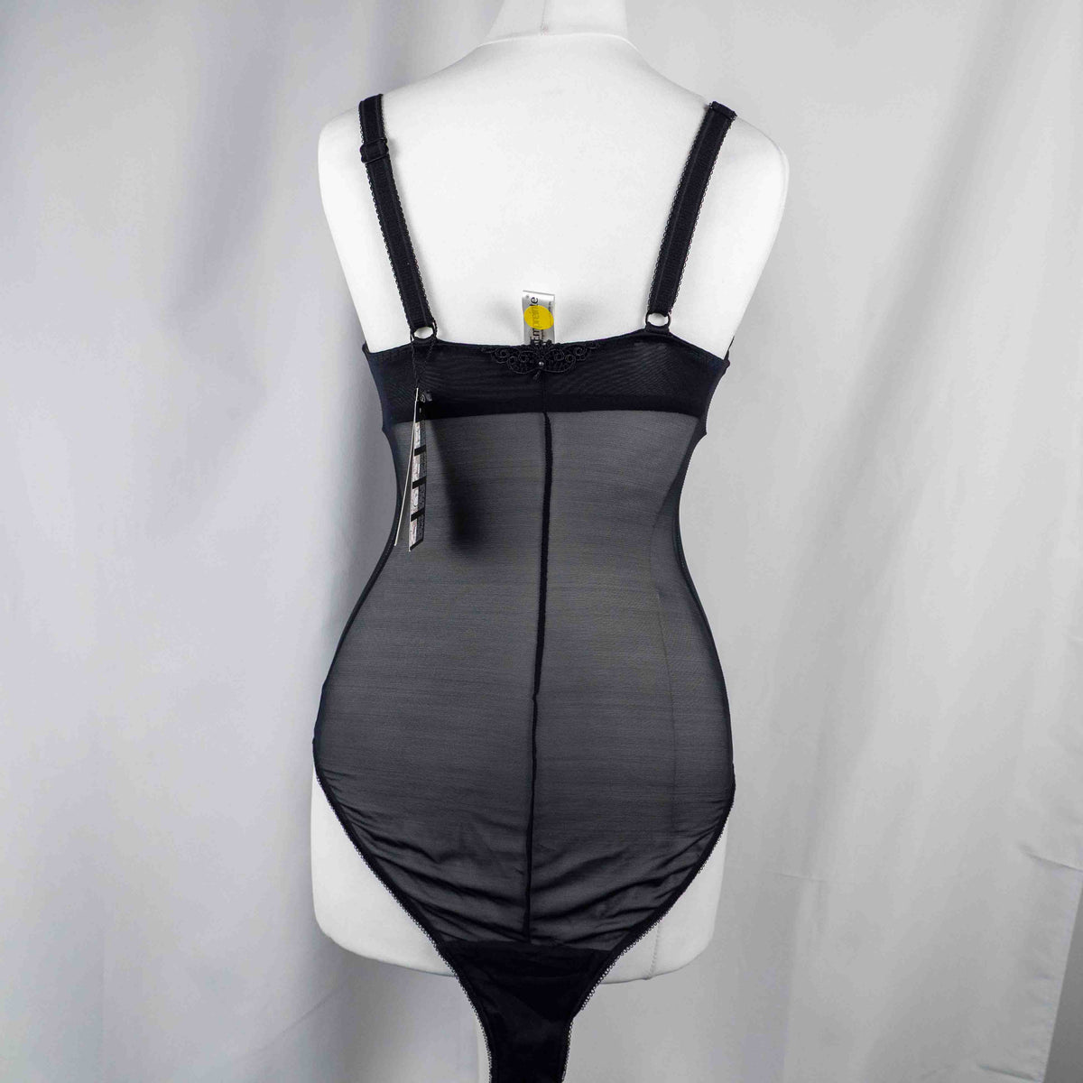 Empreinte black shapewear bodysuit with lace detailing, underwired cups, adjustable straps.