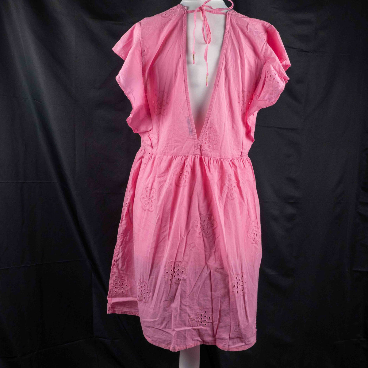 Papaya pink casual dress with embroidered floral patterns and flutter sleeves.