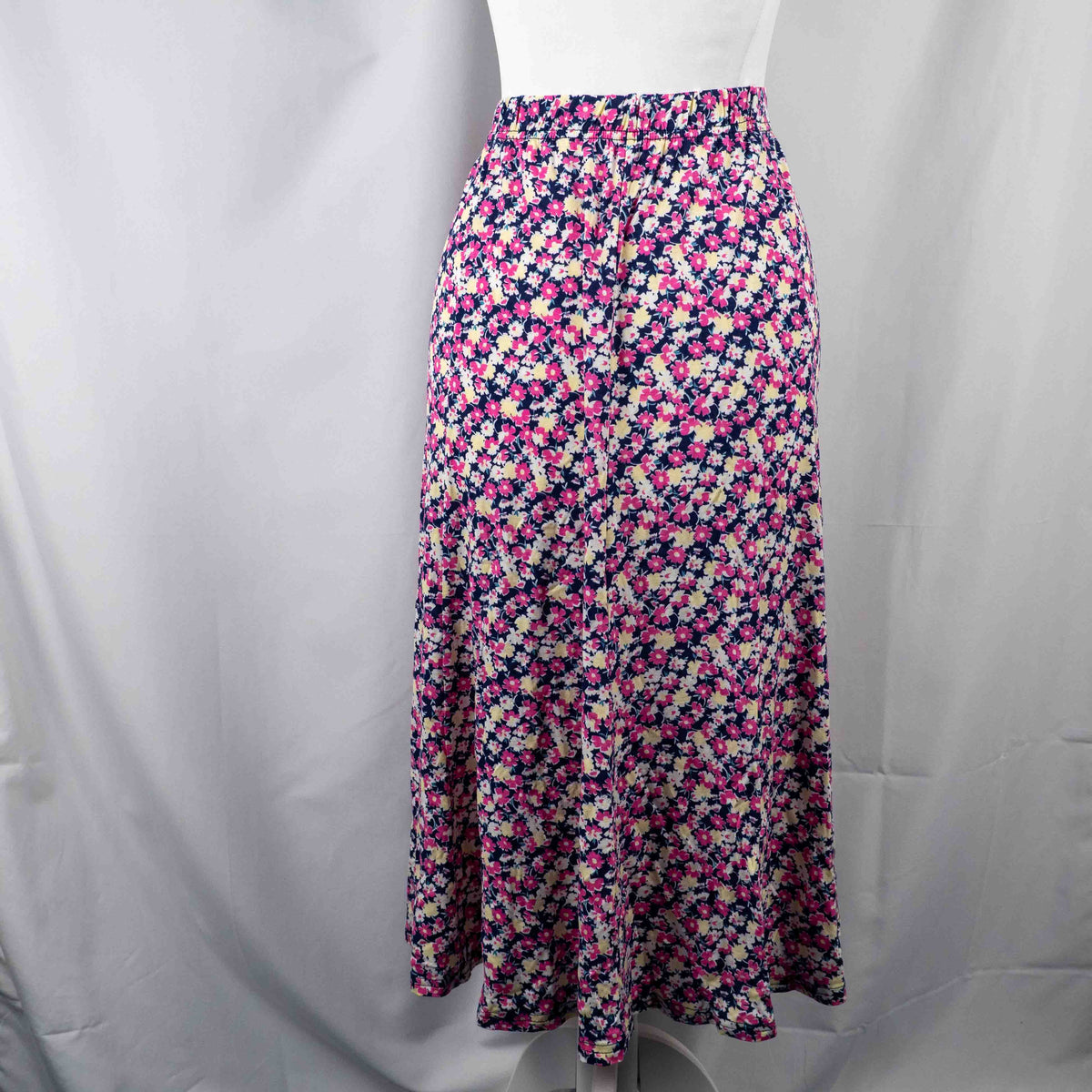 Monique Collection pink floral midi skirt with elastic waistband and soft viscose blend.
