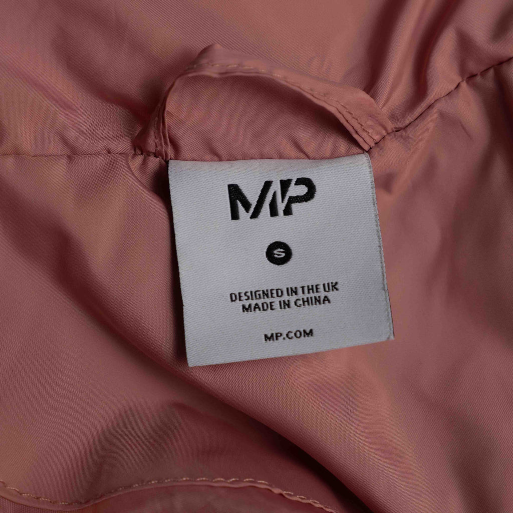 MP pink zip up puffer jacket with horizontal quilting and minimal logo on chest.
