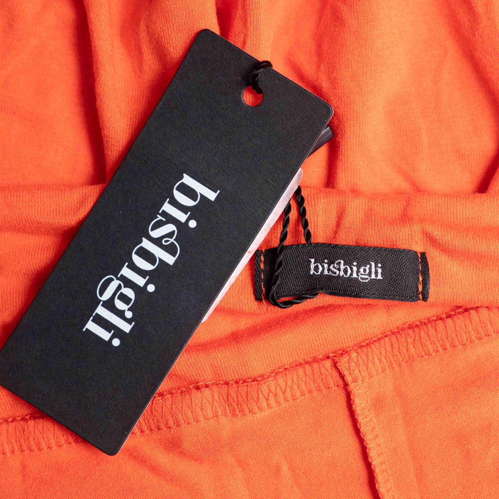 Bisbigli orange maxi dress with gold bar detailing on shoulder straps, lace material.
