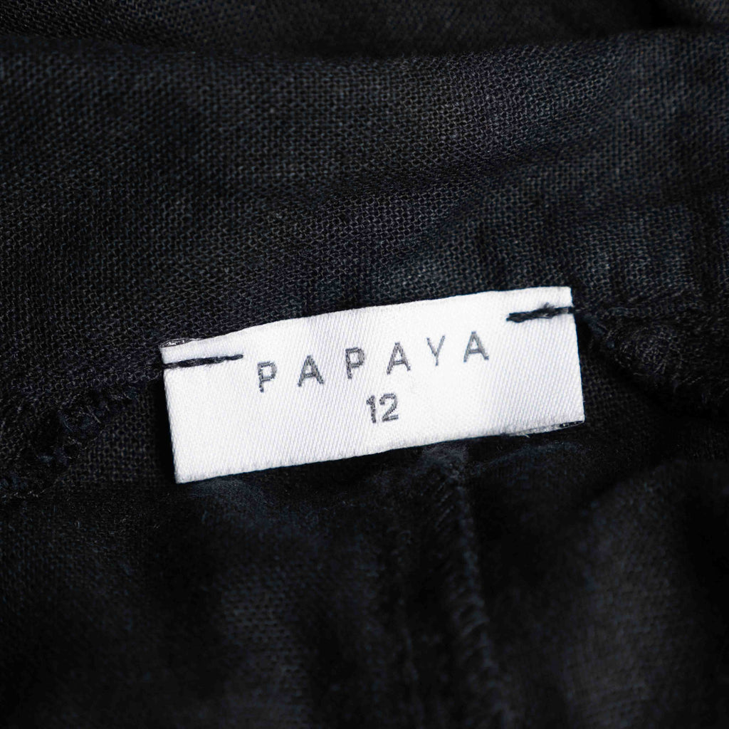 Papaya black shirt dress with button-down front, matching belt, and chest pockets.