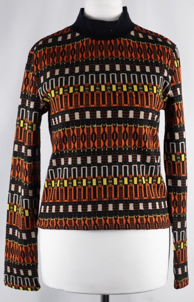 Zara black crewneck sweater with orange, yellow, and cream geometric pattern.