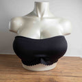 Next black strapless bandeau bra with scalloped hem and multiple hook back closure.