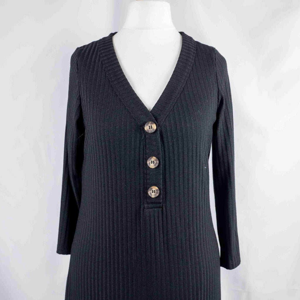 Unbranded black ribbed maxi dress with V neckline and three decorative front buttons.