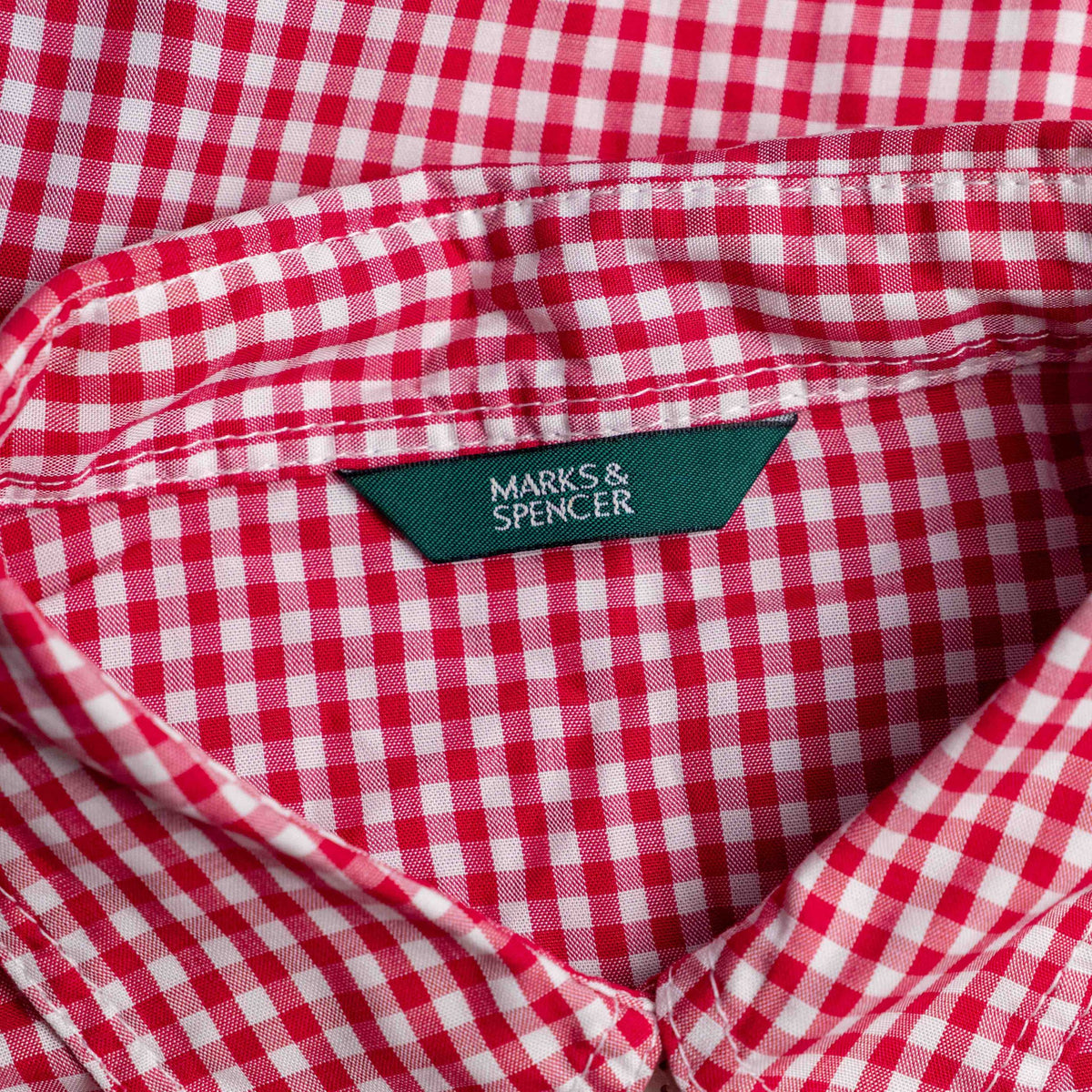 Marks & Spencer red and white gingham sleeveless shirt with classic collar and chest pocket.