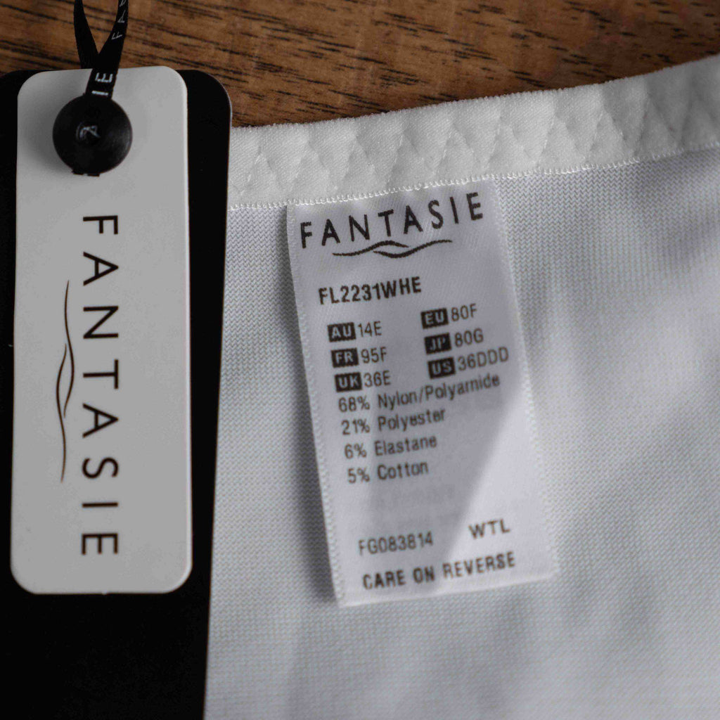 Fantasie white underwire bra size 36E with adjustable straps and supportive cups.
