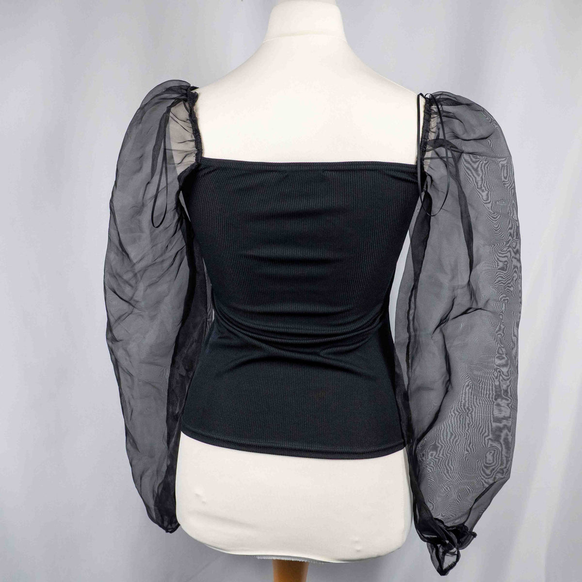 New Look black ribbed top with sheer balloon sleeves, brand new with tags.