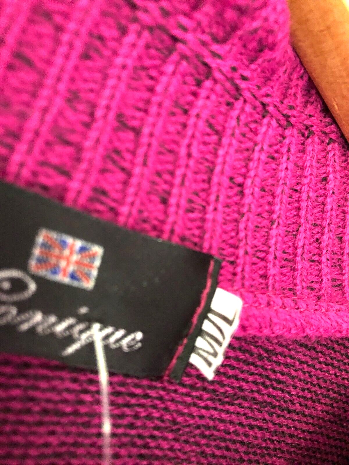 Monique pink crewneck sweater with mock scarf detail and toggle fastening.