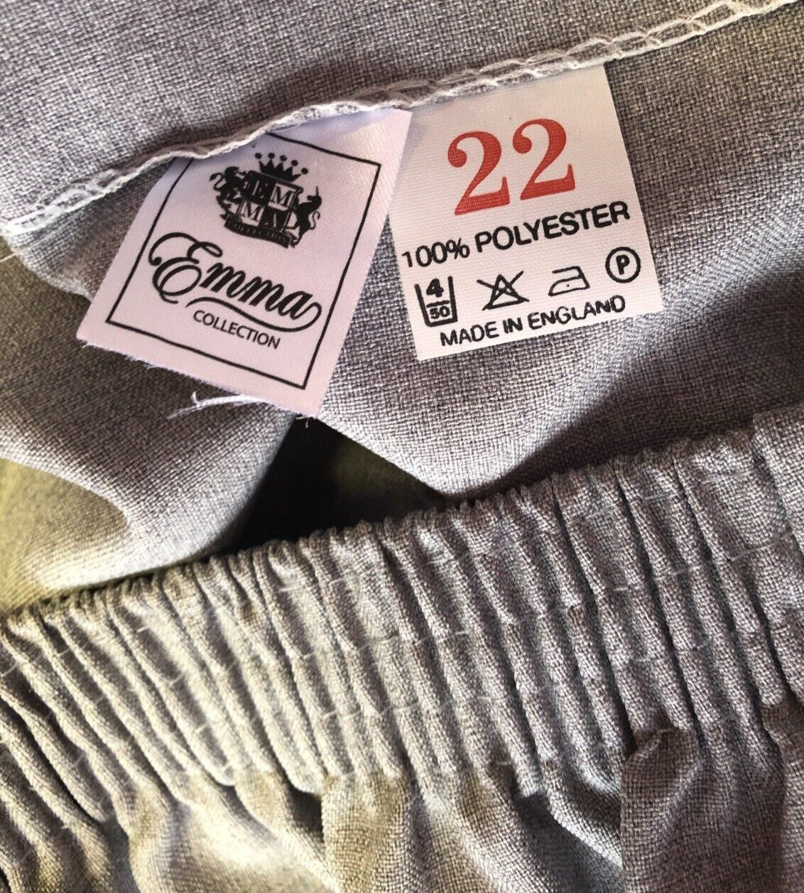 Emma grey trousers straight leg elasticated waist 100% polyester with front slant pockets.