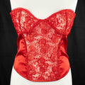 Red corset top with sheer floral lace bodice and satin sides, adjustable lace-up back.