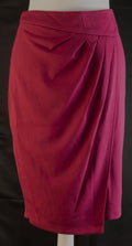 Next pink mini skirt with back zip closure and pleated front, new with tag.