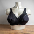 Anonymous black lace bra with soft cups and adjustable straps, brand new with tags.