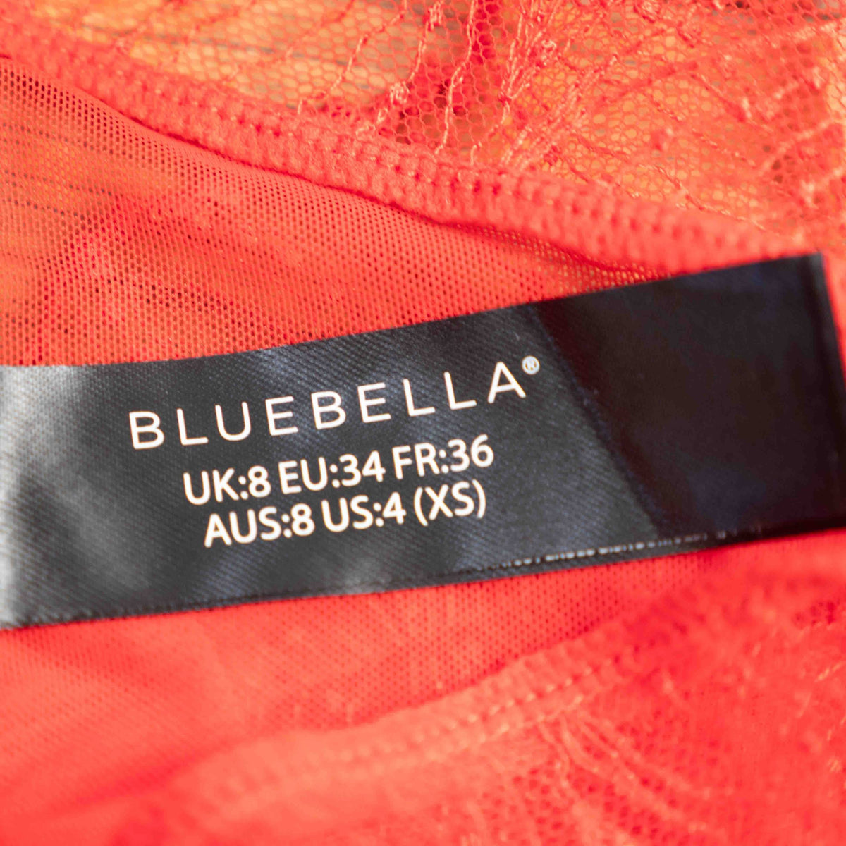 Bluebella red lace briefs with delicate detailing and size UK 8 tag.