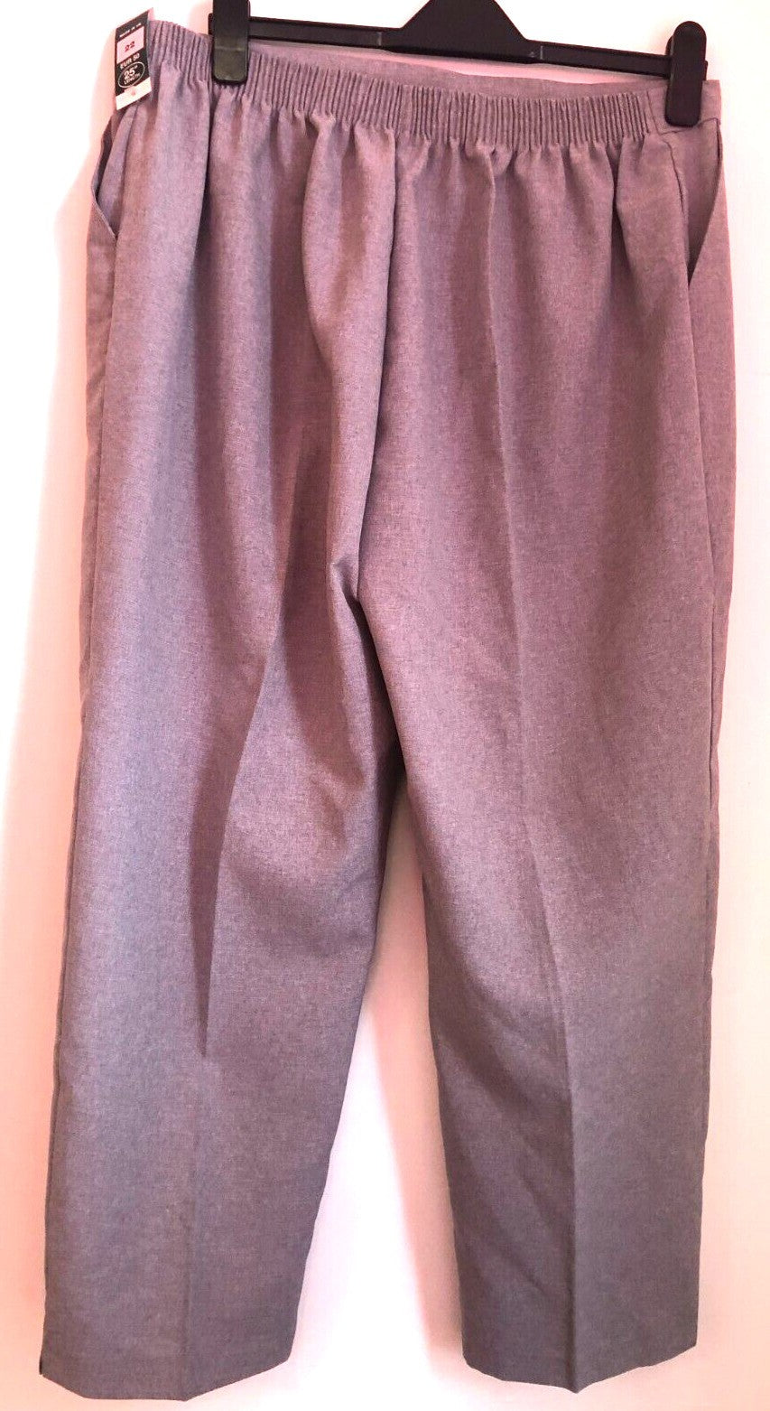 Emma grey trousers straight leg elasticated waist 100% polyester with front slant pockets.