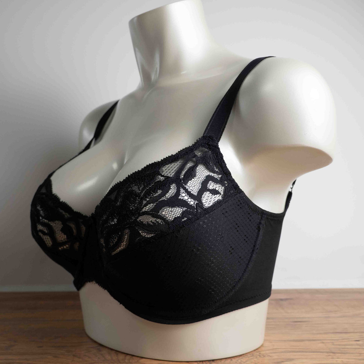 M&S black lace underwired bra with floral lace upper cups and adjustable straps.