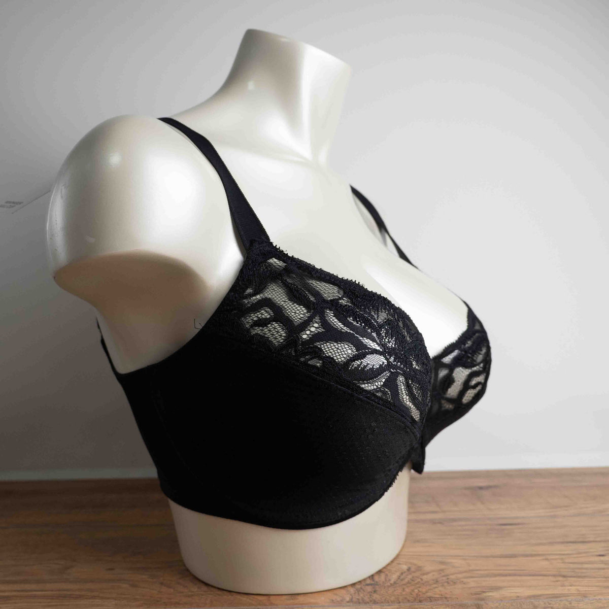 M&S black lace underwired bra with floral lace upper cups and adjustable straps.