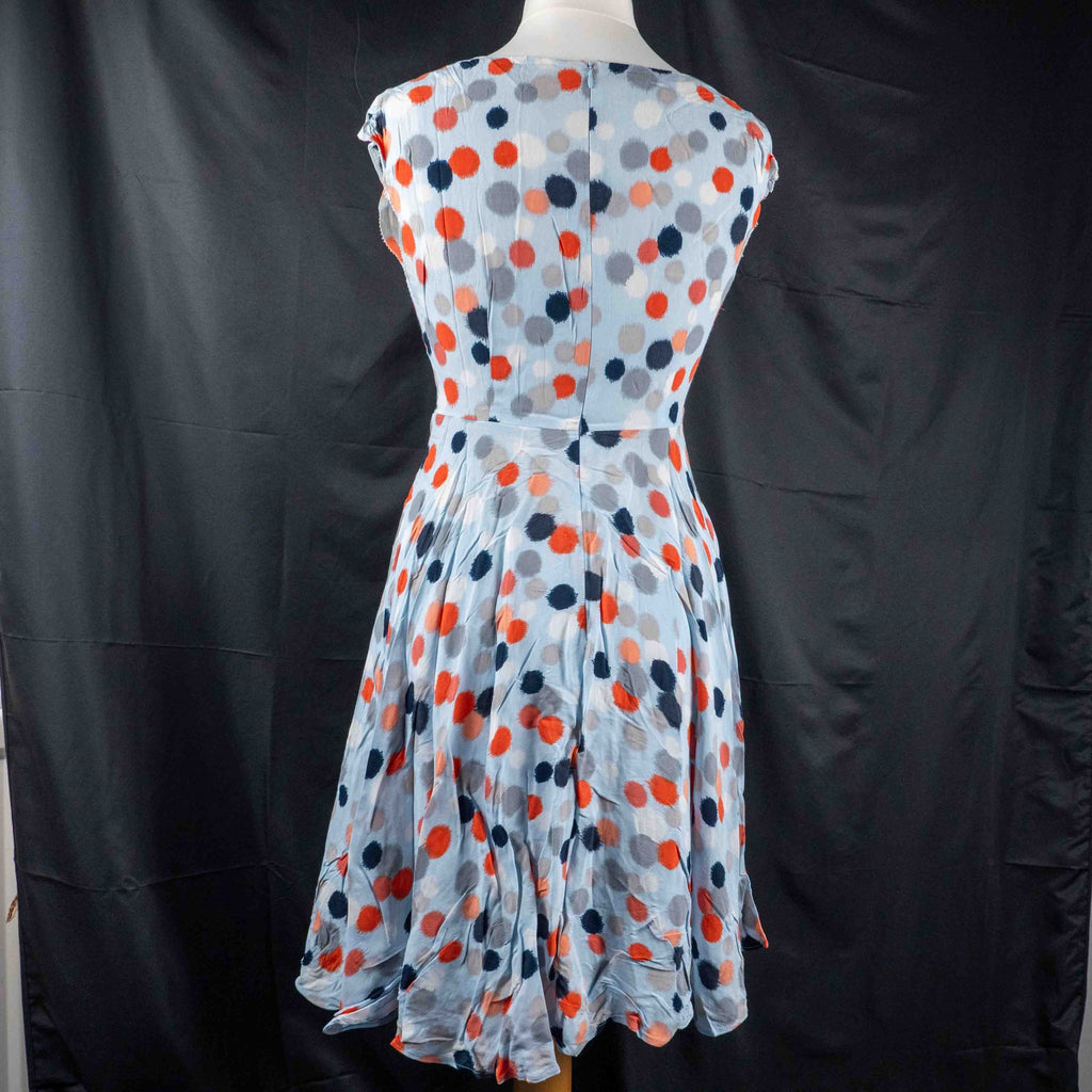 Hobbs London blue multicolour polka dot dress with ruffle hem and fitted waist.