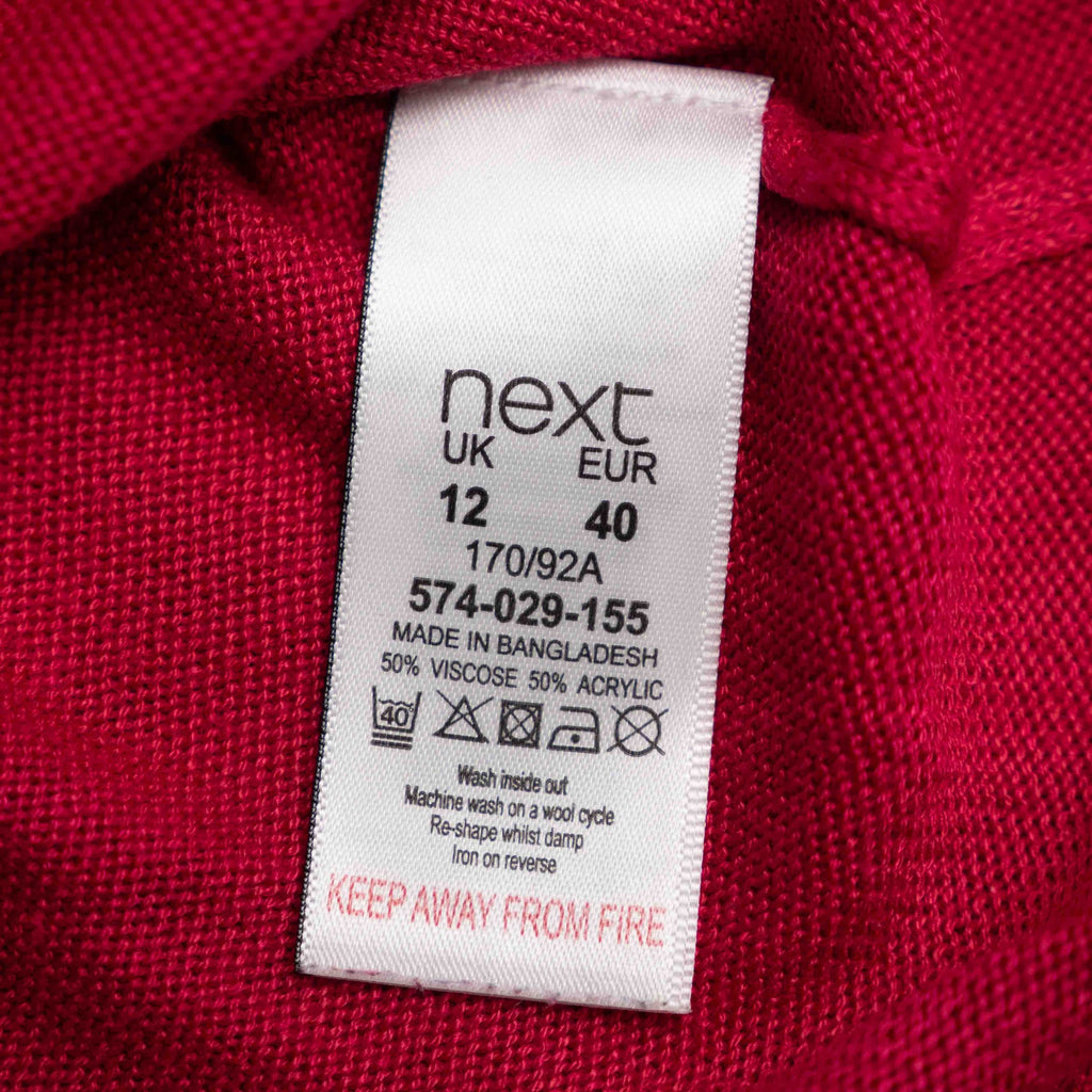 Next pink lightweight sweater with fine knit detailing on raglan sleeves and neckline.