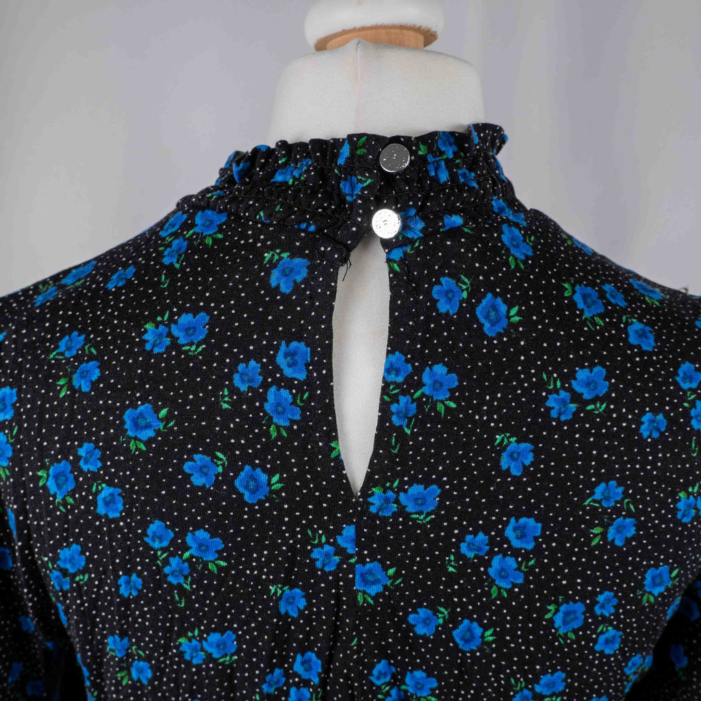 New Look black dress with blue floral print, ruffled high neckline, long sleeves.