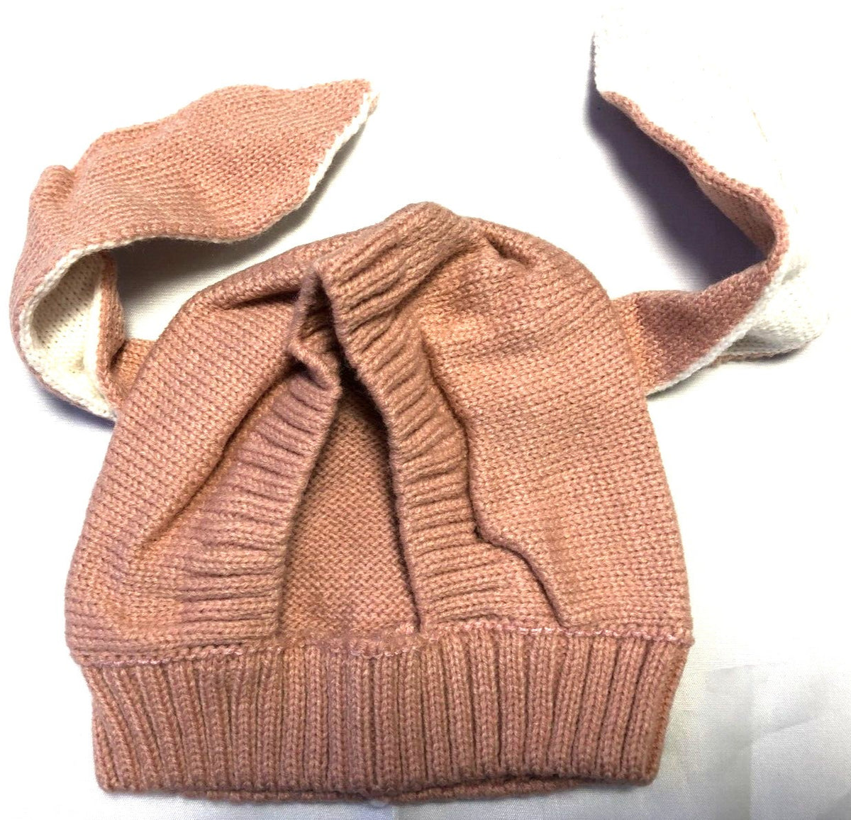 Toddlers brown knitted wooly hat with floppy rabbit ears, balaclava style.