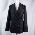 H&M black double-breasted blazer with structured lapel and six front buttons.