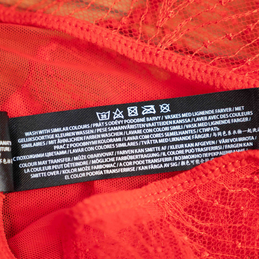 Bluebella red lace briefs with delicate detailing and size UK 8 tag.