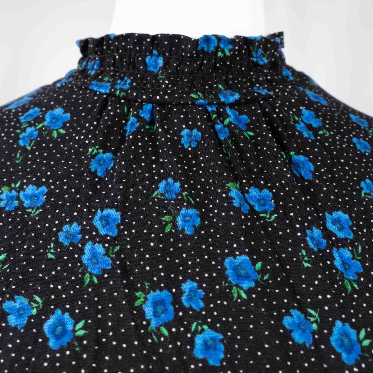 New Look black dress with blue floral print, ruffled high neckline, long sleeves.